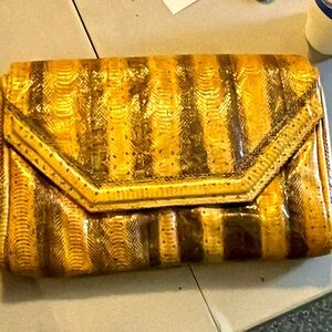 Biella snake skin clutch. With change bag.